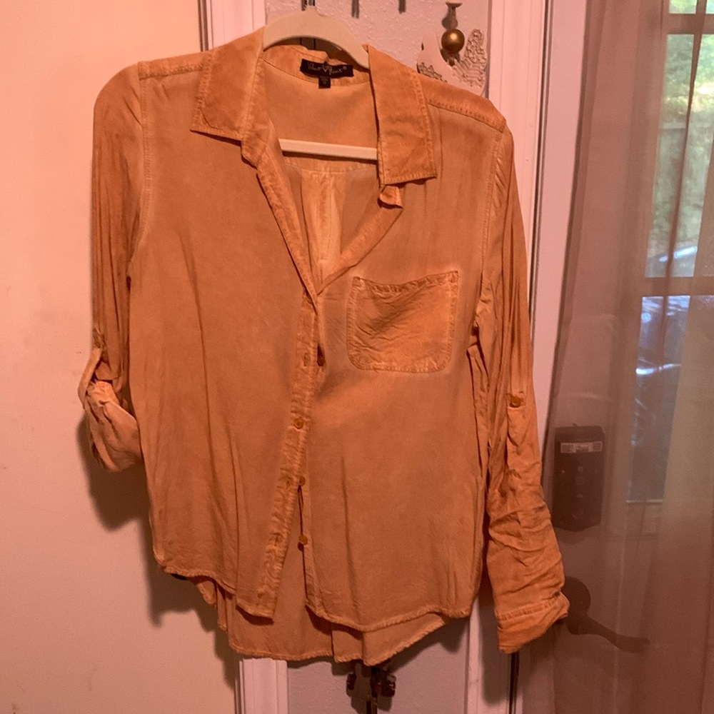 Gold colored button down top